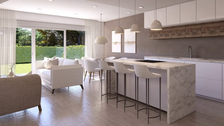 Imagen de comedor con cocina americana y salida al jardín